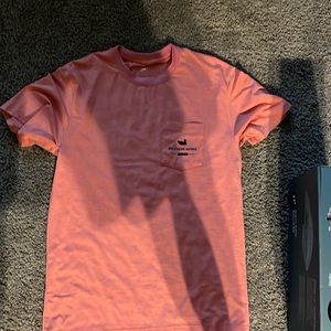 Southern marsh, salmon, colored T-shirt.